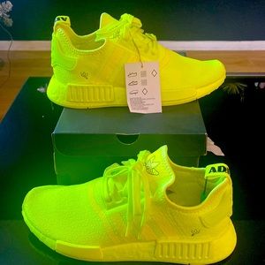 Brand new solar yellow Adidas NMD R1.